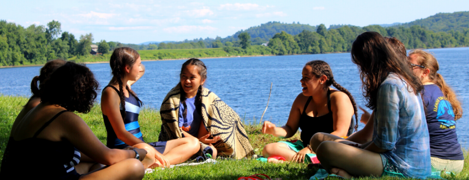Students on the shore of the Connecticut River at the New England High School Summer Program